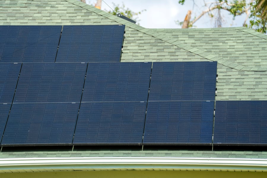 aerial-view-of-regular-american-home-roof-with-blu-2024-02-16-05-46-47-utc